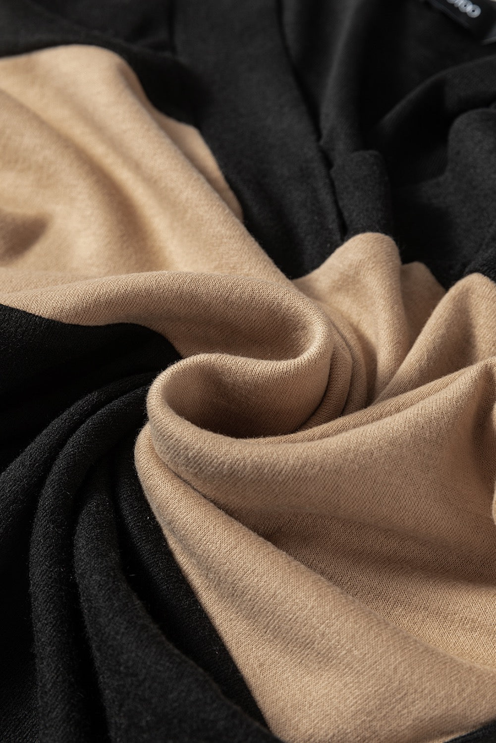 BLACK & TAN VNECK TOP WITH BUTTON SLEEVE DETAIL