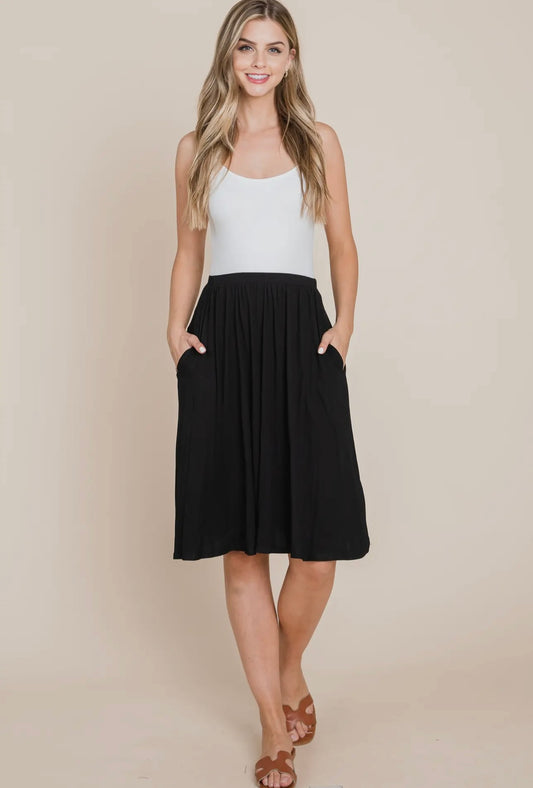 BLACK SOFT MIDI-SKIRT WITH POCKETS