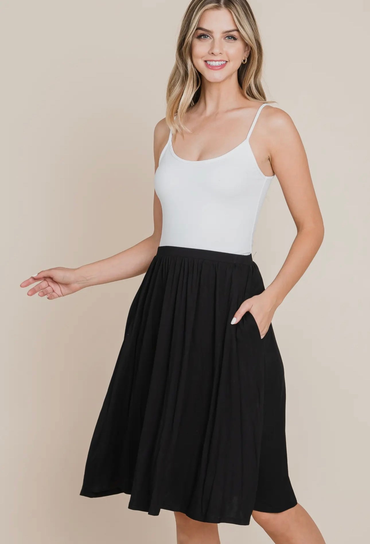 BLACK SOFT MIDI-SKIRT WITH POCKETS